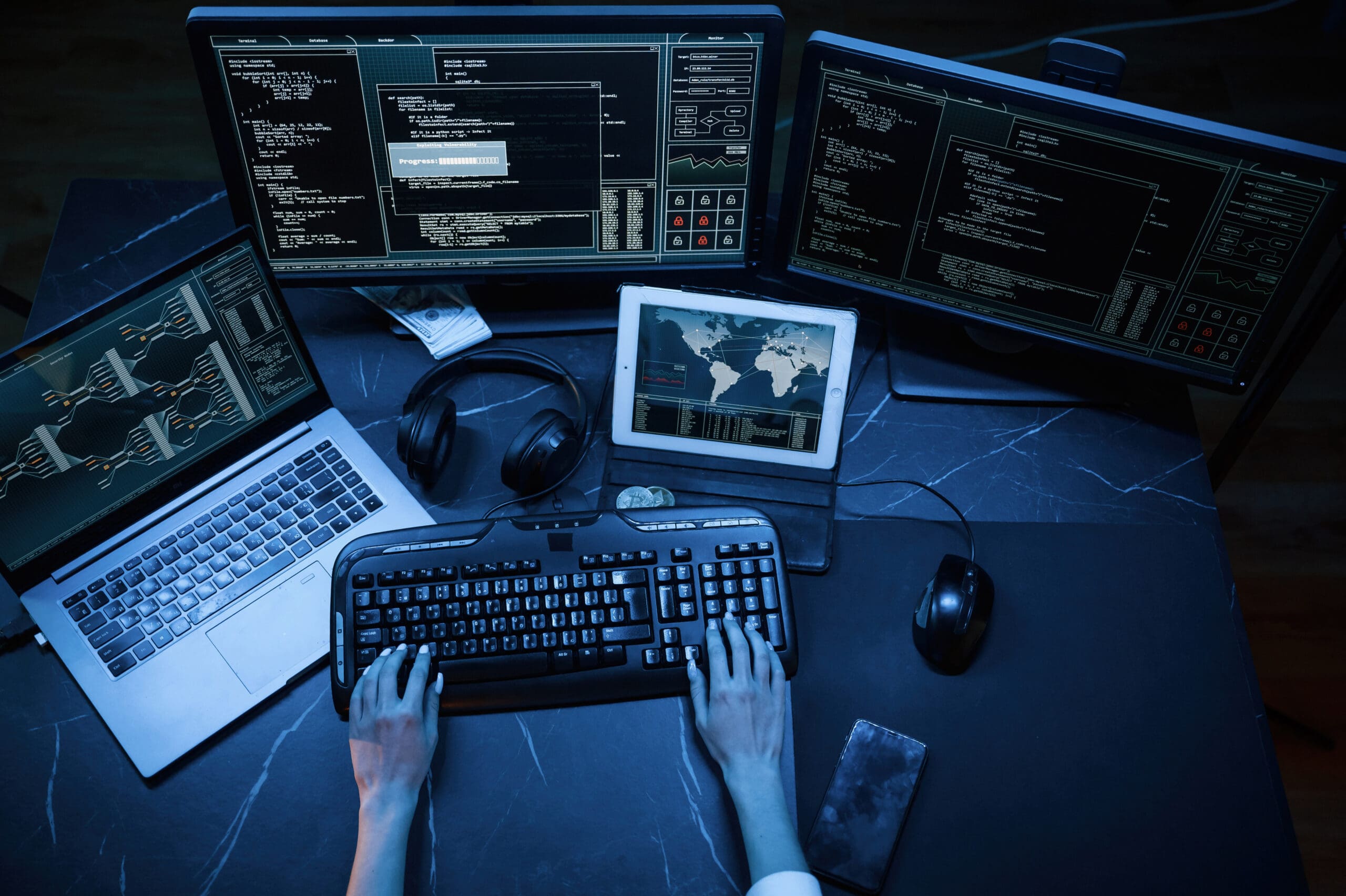 Hands typing on a keyboard, symbolising penetration testing and ethical hacking activities.